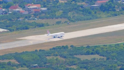 Croatia, Split, August 19, 2019. The plane takes off on the runway Stock Footage 124491411