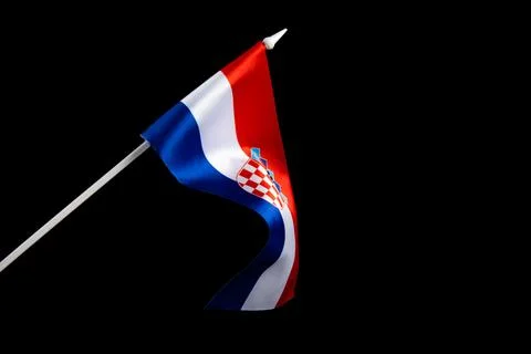 The Croatian flag on a black background developing and fluttering in the wind Stockfoto's