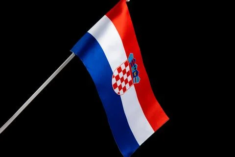 The Croatian flag on a black background developing and fluttering in the wind Stock Photos