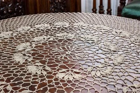 Crochet doily on table Stock Photos