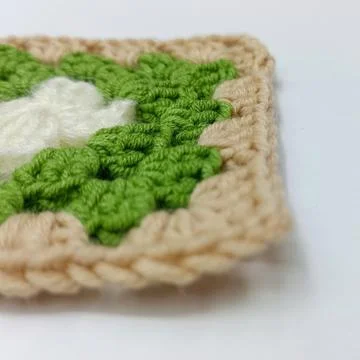 Crochet granny square pattern close-up Stock Photos