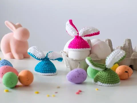 Crochet hats with ears for Easter eggs Stock Photos