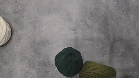 Crochet pattern from knitted ribbons. Different colors Stock Footage 312552371