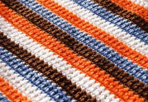 Crochet, pattern from multi-colored cotton threads, double crochet. Stock Photos