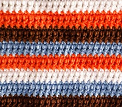 Crochet, pattern from multi-colored cotton threads, double crochet. Stock Photos