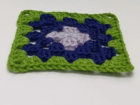 Crochet square element for blanket or patchwork Foto stock