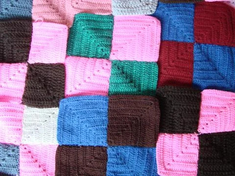Crochet texture, colorful squares pattern. Crochet Knit Squares Stock Photos