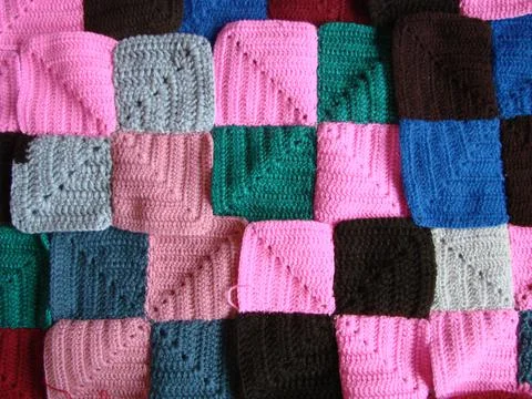 Crochet texture, colorful squares pattern. Crochet Knit Squares Stock Photos