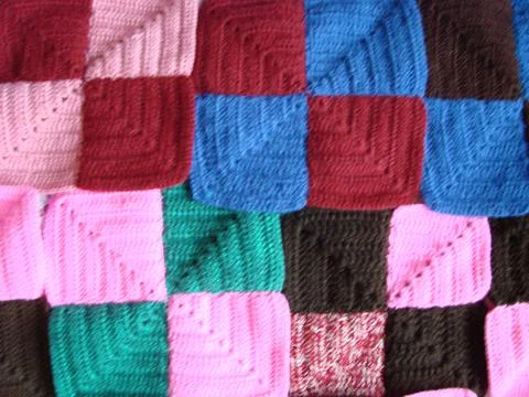 Crochet texture, colorful squares pattern. Crochet Knit Squares 스톡 사진