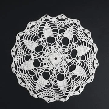A crocheted doily Stock Photos