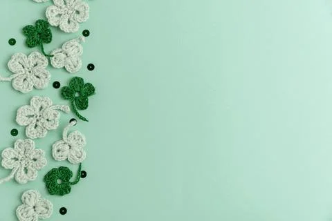 Crocheted Four Leaf Clovers with Sequins.  Saint Patricks Day Decorative Ba.. Stock Photos