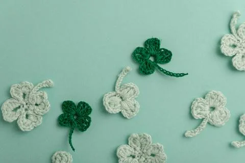 Crocheted Four Leaf Clovers with Sequins.  Saint Patricks Day Decorative Ba.. Stock Photos