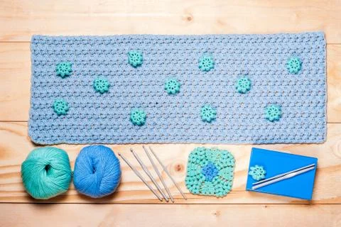 Crocheted napkins with pattern with decorative elements, knitting accessories Stock Photos