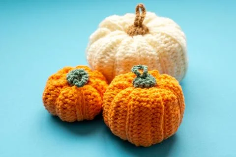 Crocheting fall pumpkins decorating for autumn halloween celebration Stock Photos