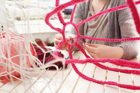 Crocheting. Hand needlework. Stock Photos