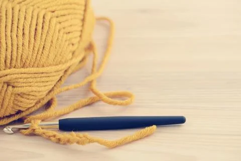 Crocheting with wool ball Foto stock