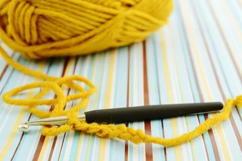 Crocheting with wool ball Foto stock