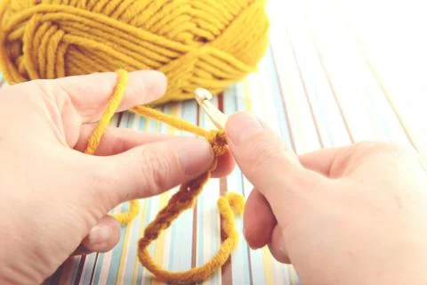 Crocheting with wool ball Stock Photos
