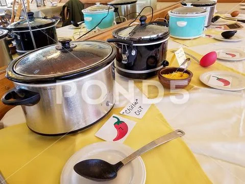 Crock pots in chili cook off contest Stock Photos