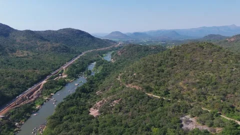 Crocodile River winding gracefully through African valley Stock Footage 340263153