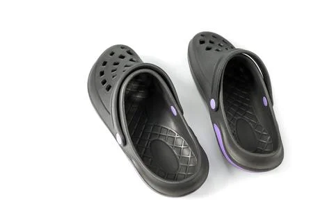 Crocs classic clogs on the white Stock Photos