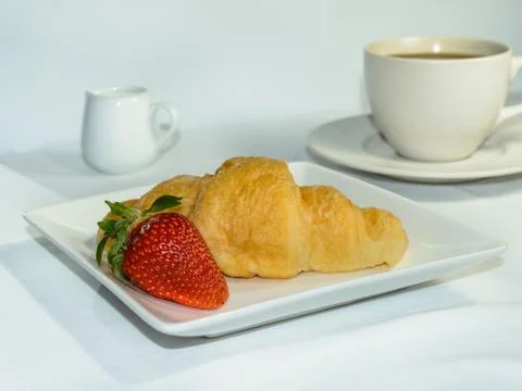 Croissant and coffee Stock Photos