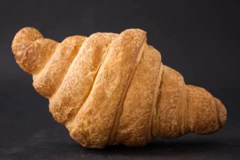 Croissant on a black background Stock Photos