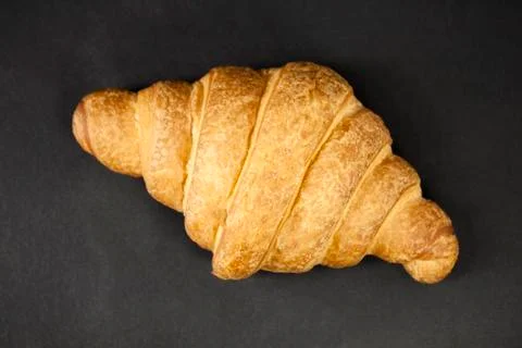 Croissant on a black background Stock Photos