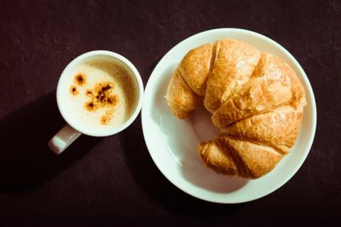 Croissant bread with coffee Stock Photos