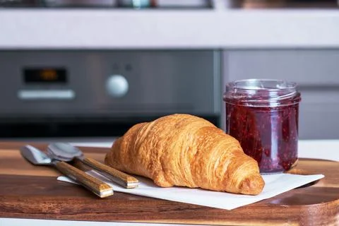 Croissant for breakfast with jam Stock Photos