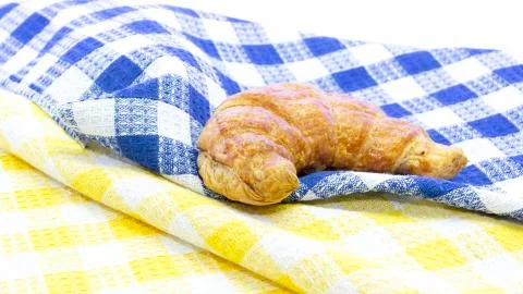 Croissant butter on two color table mat Stock Photos