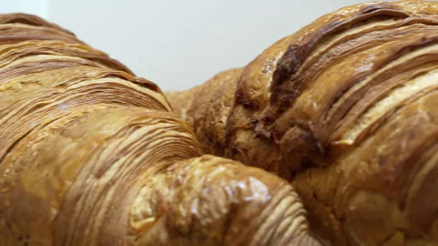 Croissant close-up on a white background. Stock Footage 239633234