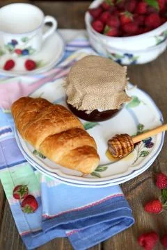 Croissant with craspberry Stock Photos