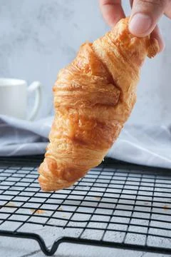 Croissant with a cup of coffee Stock Photos