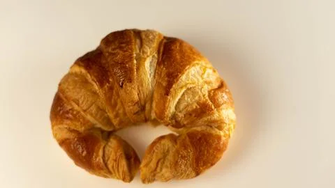 Croissant on a light background Stock Photos