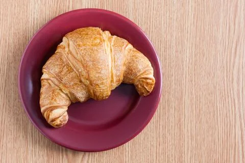Croissant on a plate Stock Photos