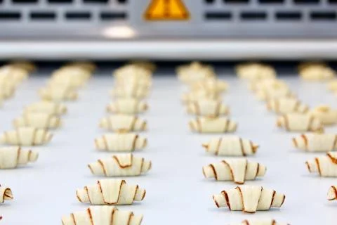 Croissant production process Stock Photos