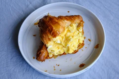 Croissant with scrambled eggs Stock Photos