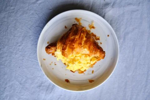 Croissant with scrambled eggs Stock Photos