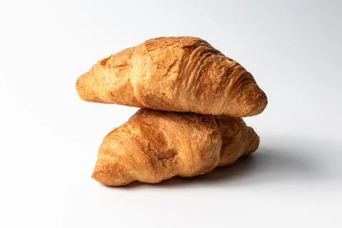 Croissant with stuffing on a white background Stock Photos