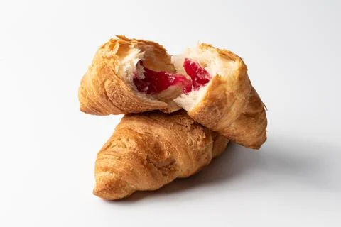 Croissant with stuffing on a white background Stock Photos