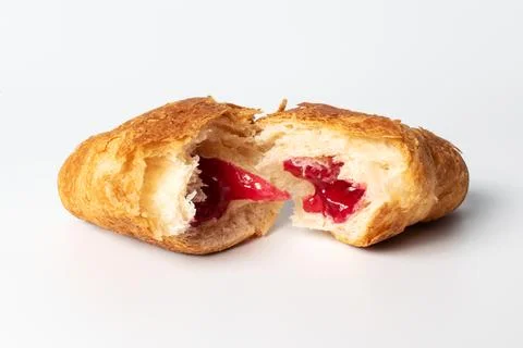 Croissant with stuffing on a white background Stock Photos