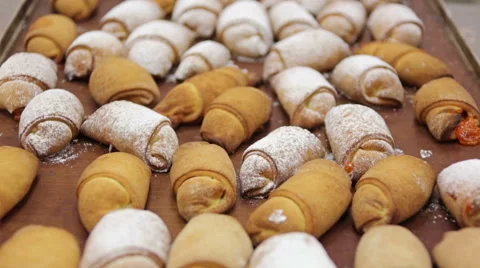 Croissants on a baking sheet Stock Footage 51442695