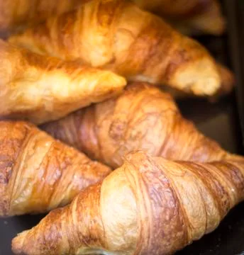 Croissants in bread shops store Stock Photos
