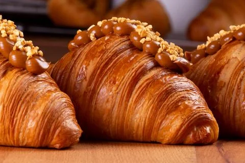 Croissants with chocolate hazelnut cream. Stock Photos