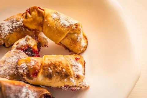 Croissants with jam. Stock Photos