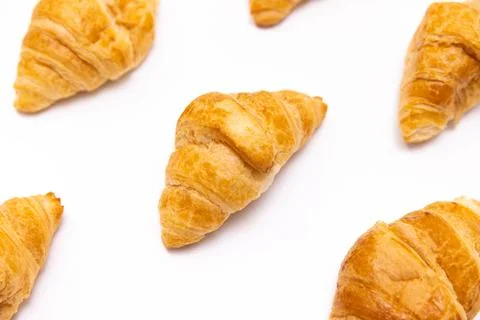 Croissants Patterned On White Surface Stock Photos