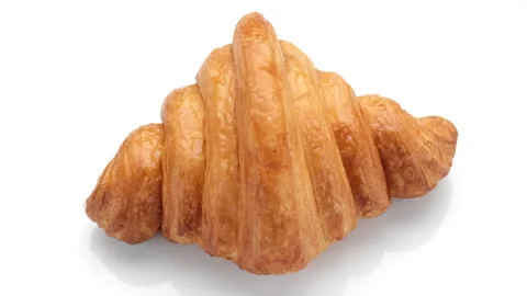 Croissants rotating on a white background Video stock 161627555