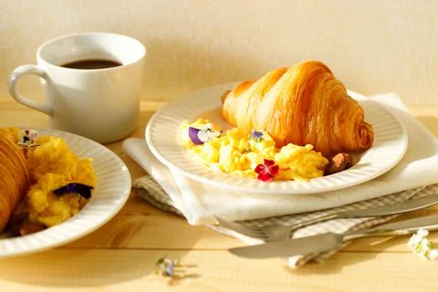Croissants with scrambled egg Foto stock