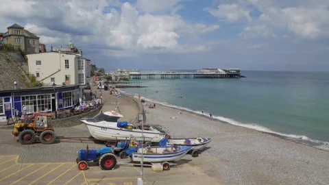 Cromer Pier and beach scene Stock Footage 313407729